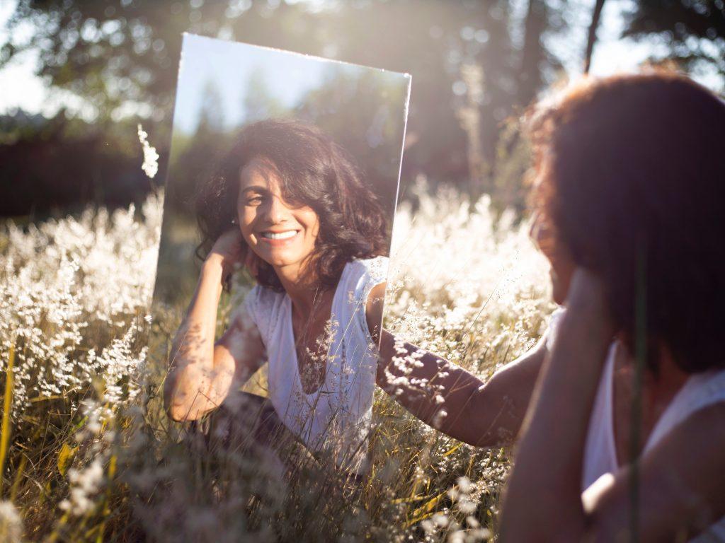 Self affirmations while looking in the mirror can lead to self love known as the mirror technique